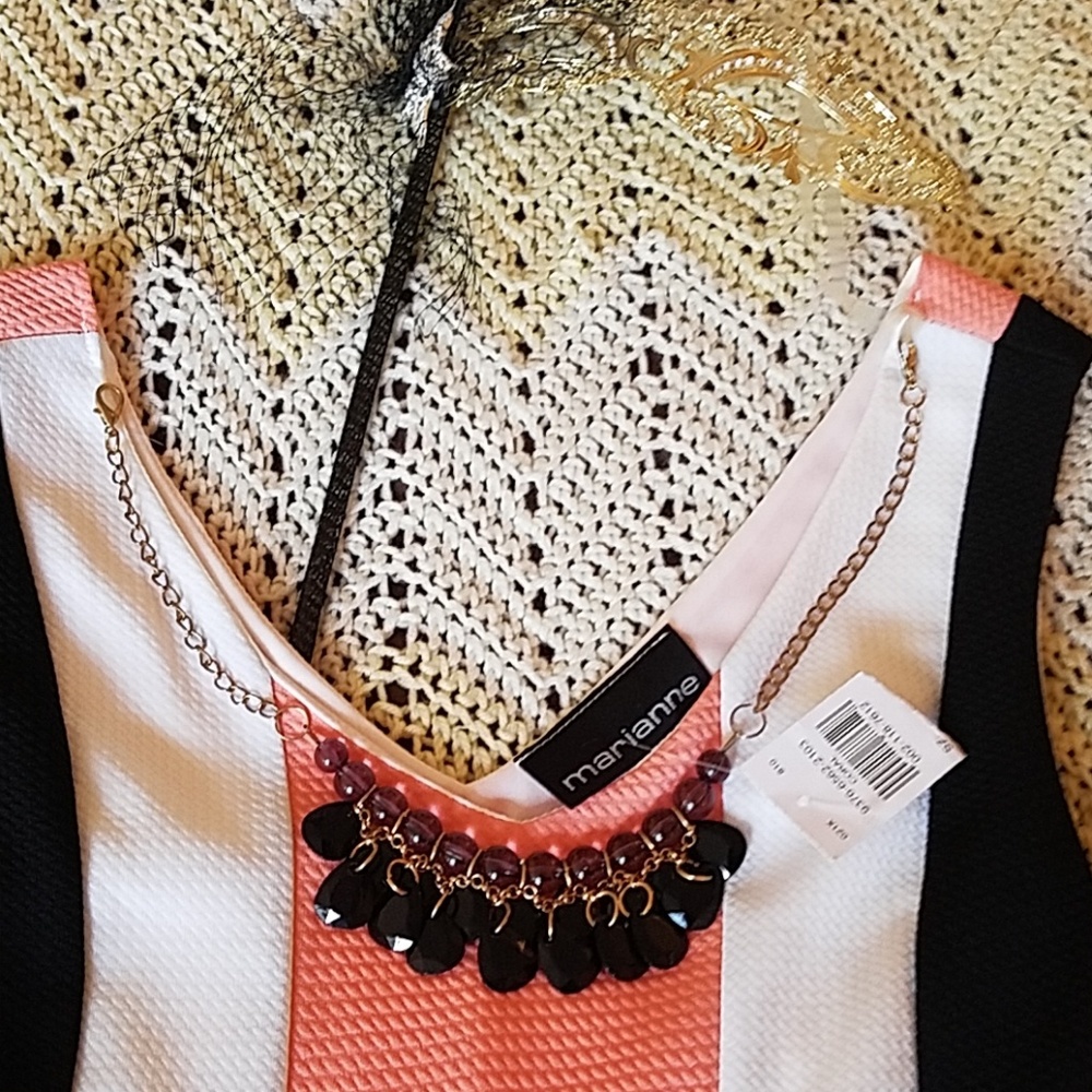 Black, white and pink dress with necklace